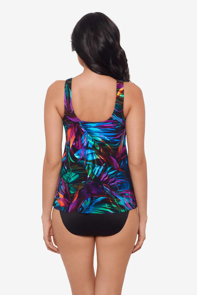 Woman facing away wearing a multicolor tankini top