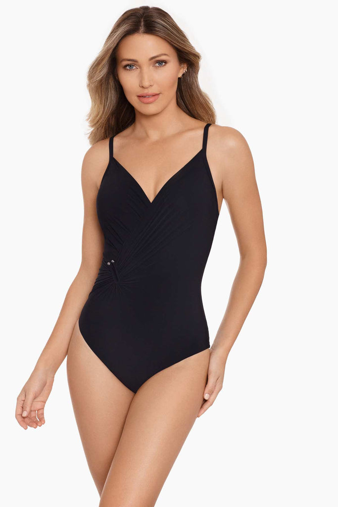 Woman in a amoressa bathing suit.